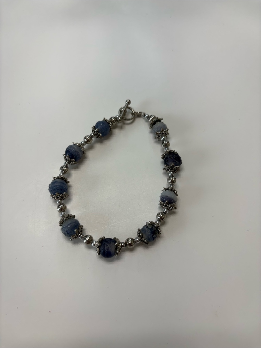 Silver Beaded Bracelet with Blue Gemstone Accents